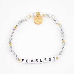 white bracelet with fearless written out in letter blocks