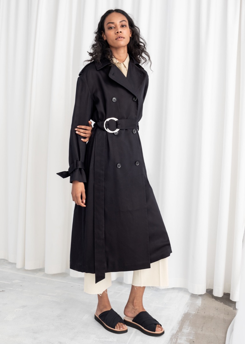 woman wearing black belted trench coat, end of summer sales 2019