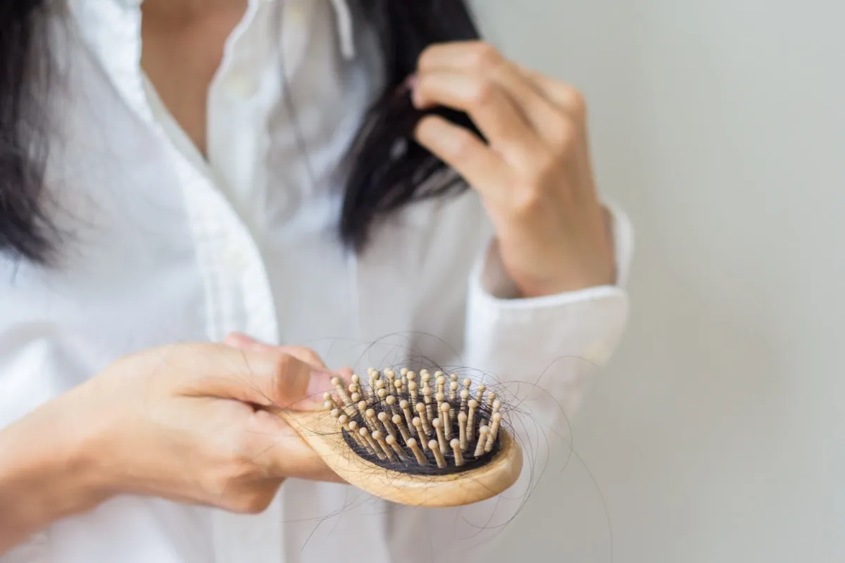 female hair loss hairbrush