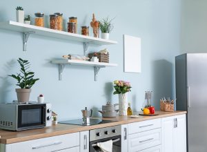 stylish kitchen with butcher block counters and stainless steel appliances, kitchen accessories