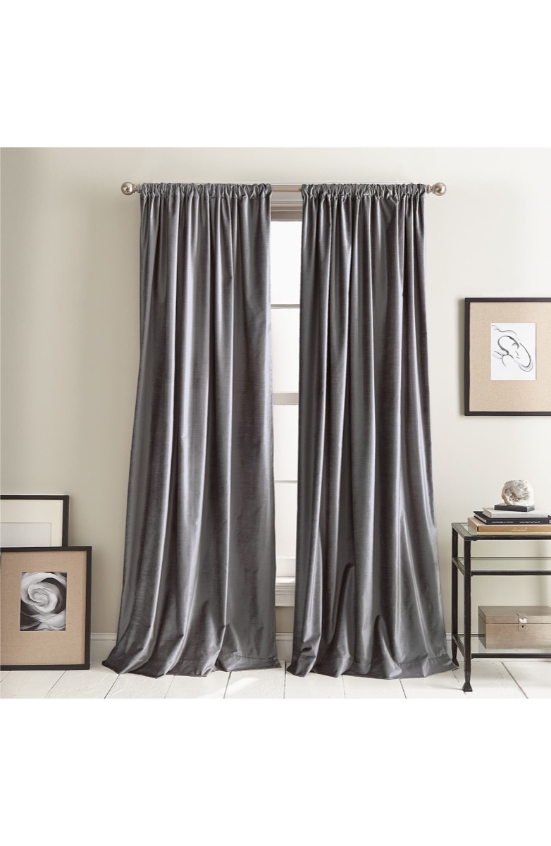 long gray velvet curtains hung in tan room, fall decorating tips