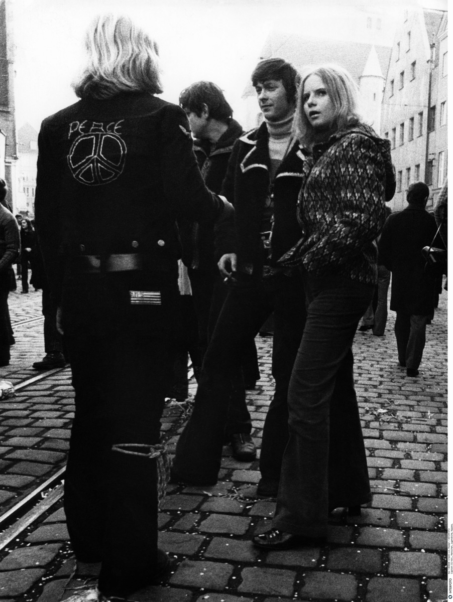 1970s youths in jackets on street in Germany