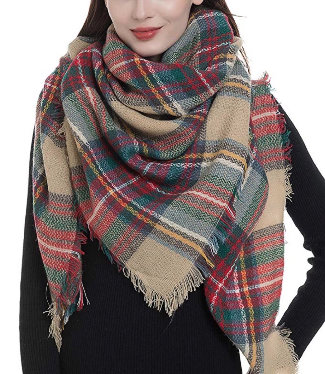 woman wearing green and red plaid scarf, hanukkah gifts
