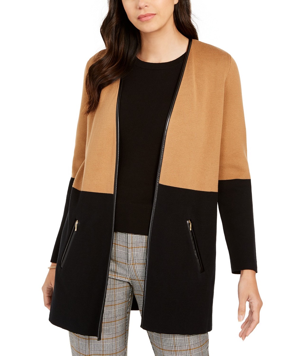 woman in tan and black color blocked cardigan