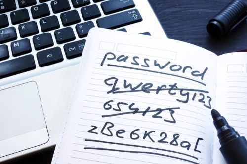 crossed out passwords on notebook