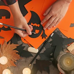 Person making DIY crafts for Halloween