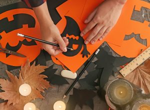 Person making DIY crafts for Halloween
