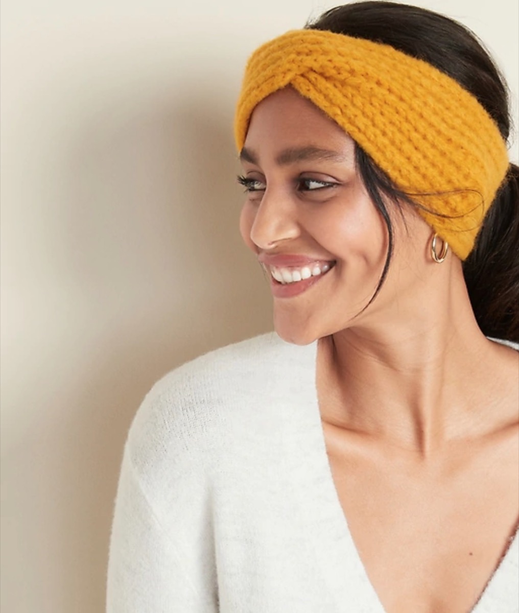 woman wearing yellow knit ear warmer