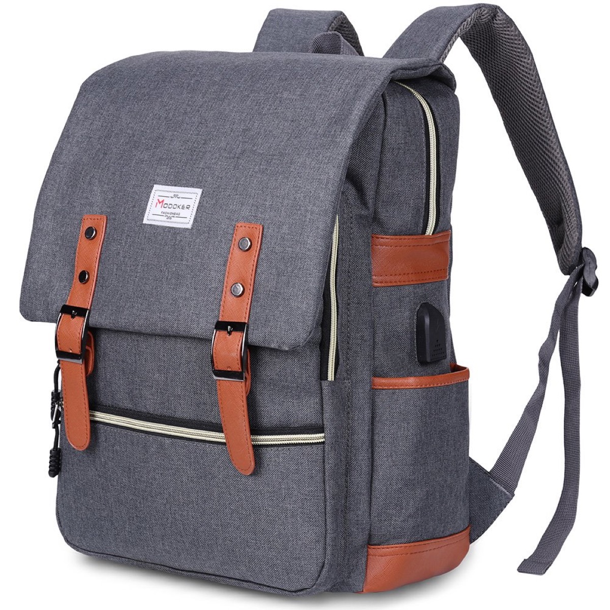 gray backpack with brown leather straps
