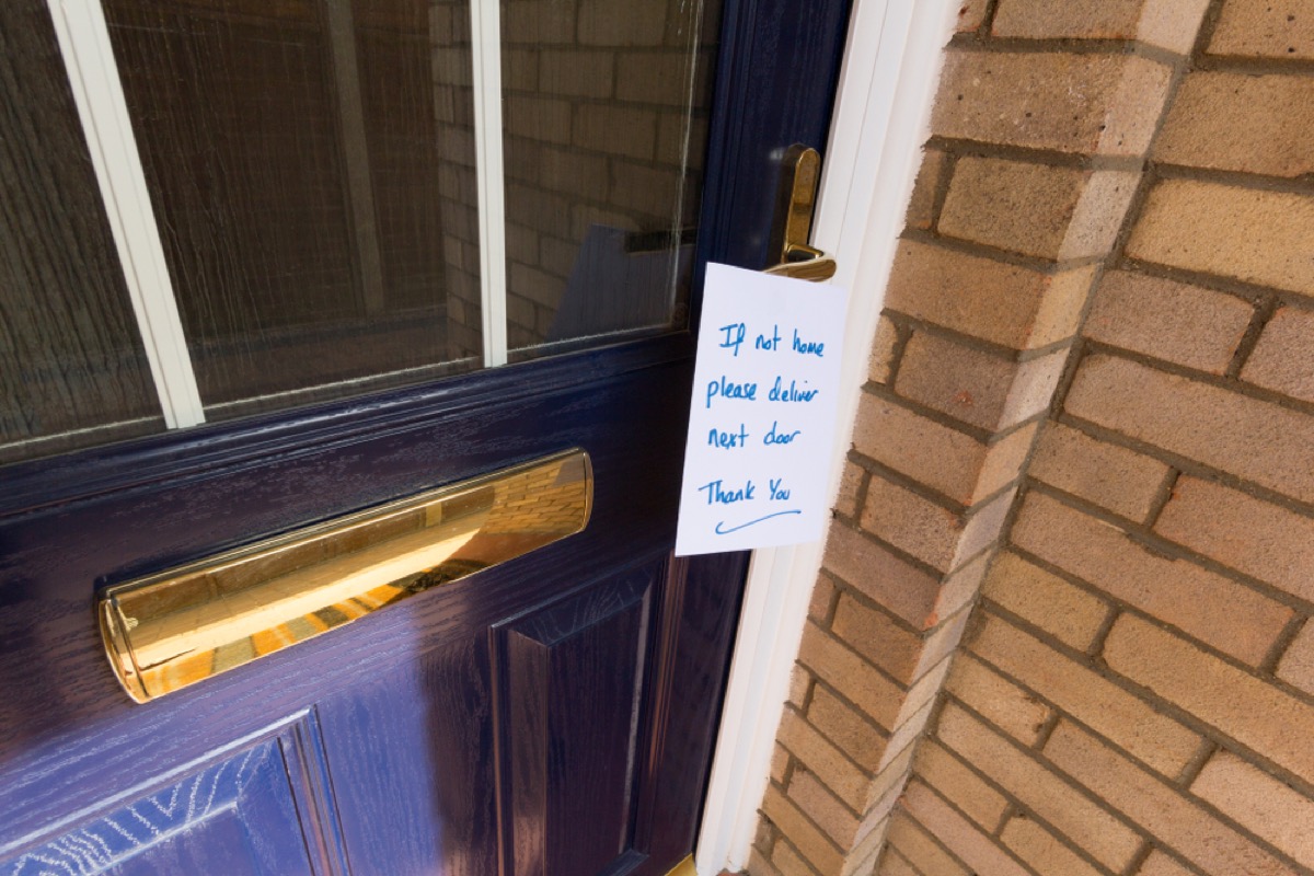 note on blue front door