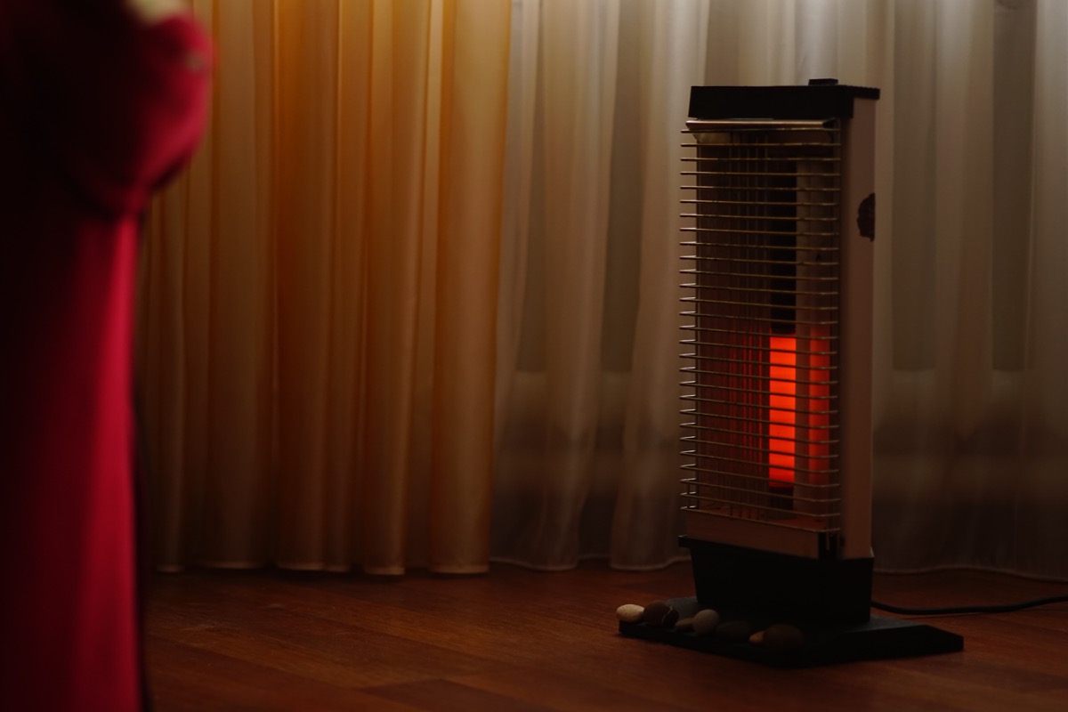 portable heater in the corner of a home
