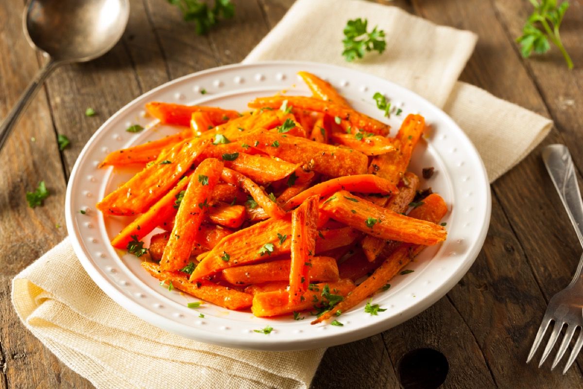 cooked carrots in white bowl, rosh hashanah facts