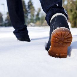 man walking in snow, men's winter boots