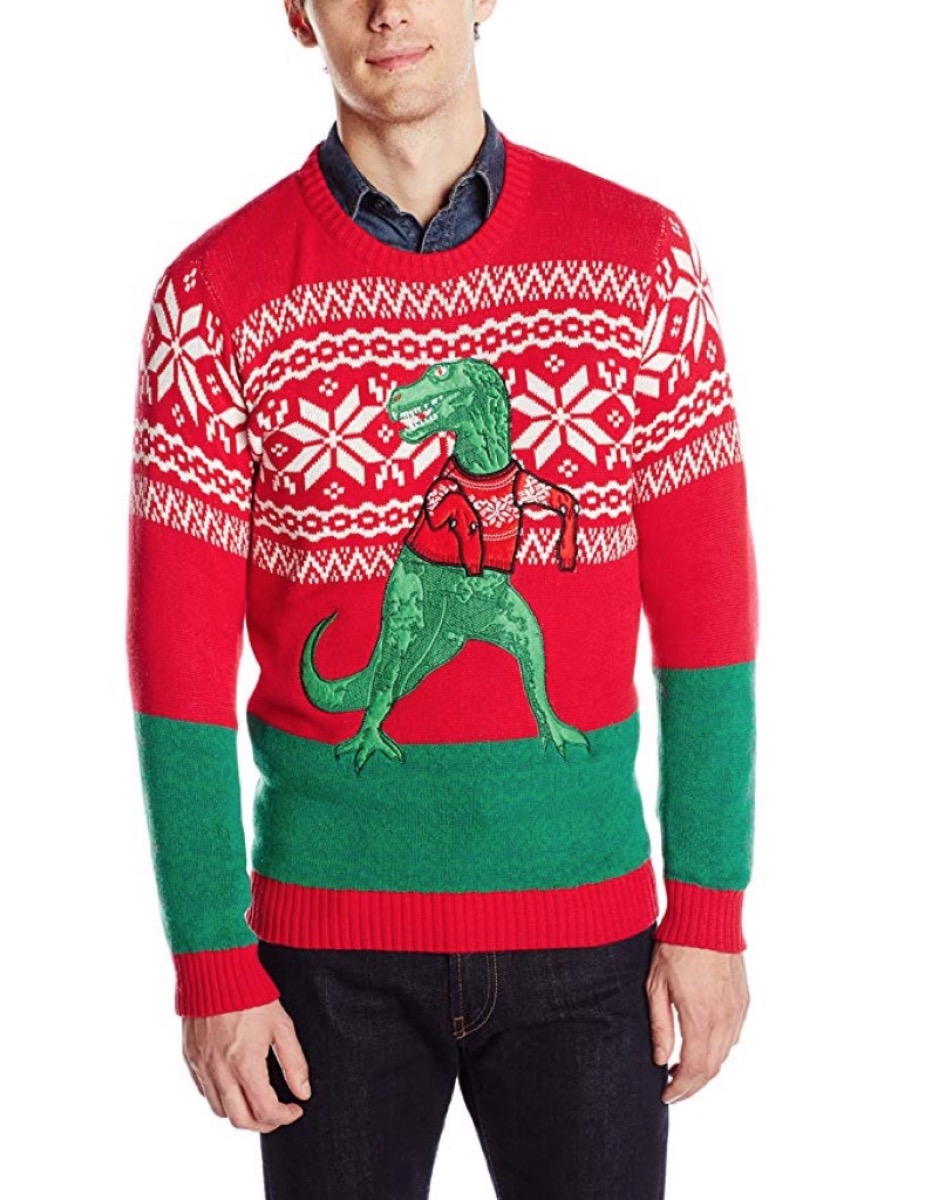 red christmas sweater with t-rex on it