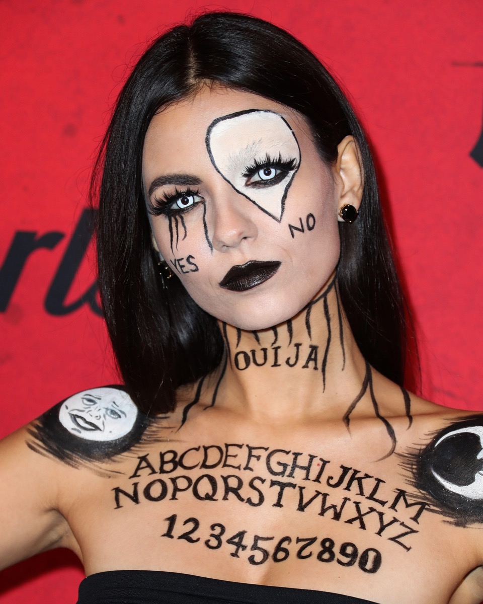 Victoria Justice dressed as an ouija board for Halloween