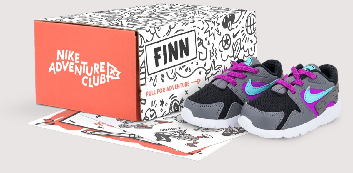 gray and purple and blue nike shoes with shoebox
