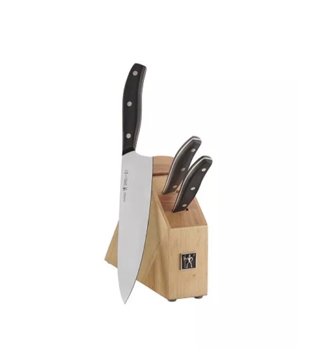 butcher block with two knives in it and large chef's knife with black handle next to it