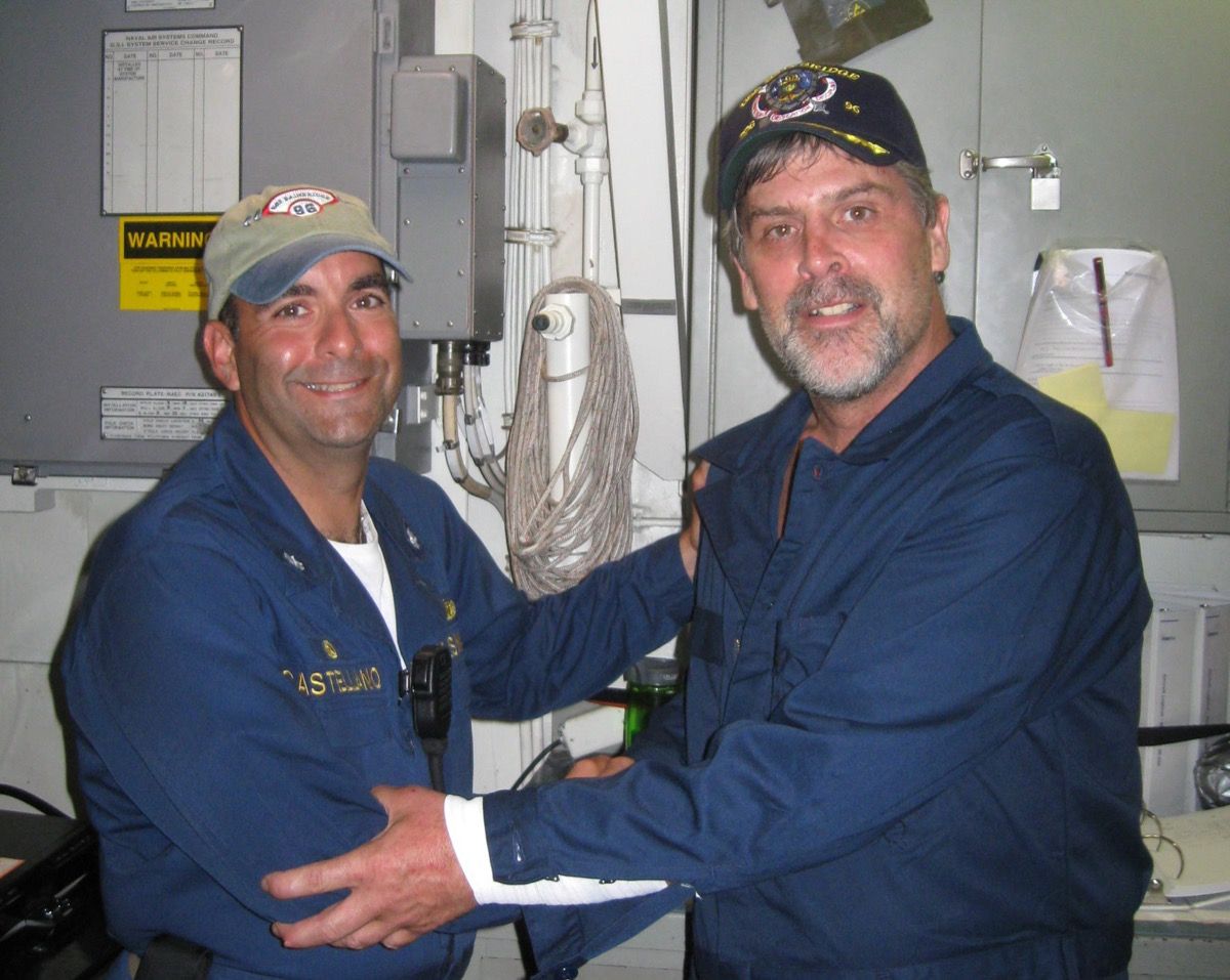 Maersk-Alabama Capt. Richard Phillips, right, stands alongside Cmdr. Frank Castellano, commanding officer of USS Bainbridge after being rescued by U.S Naval Forces off the coast of Somalia. Philips was held hostage for four days by pirates.