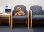 chairs and toy lion in doctors waiting room