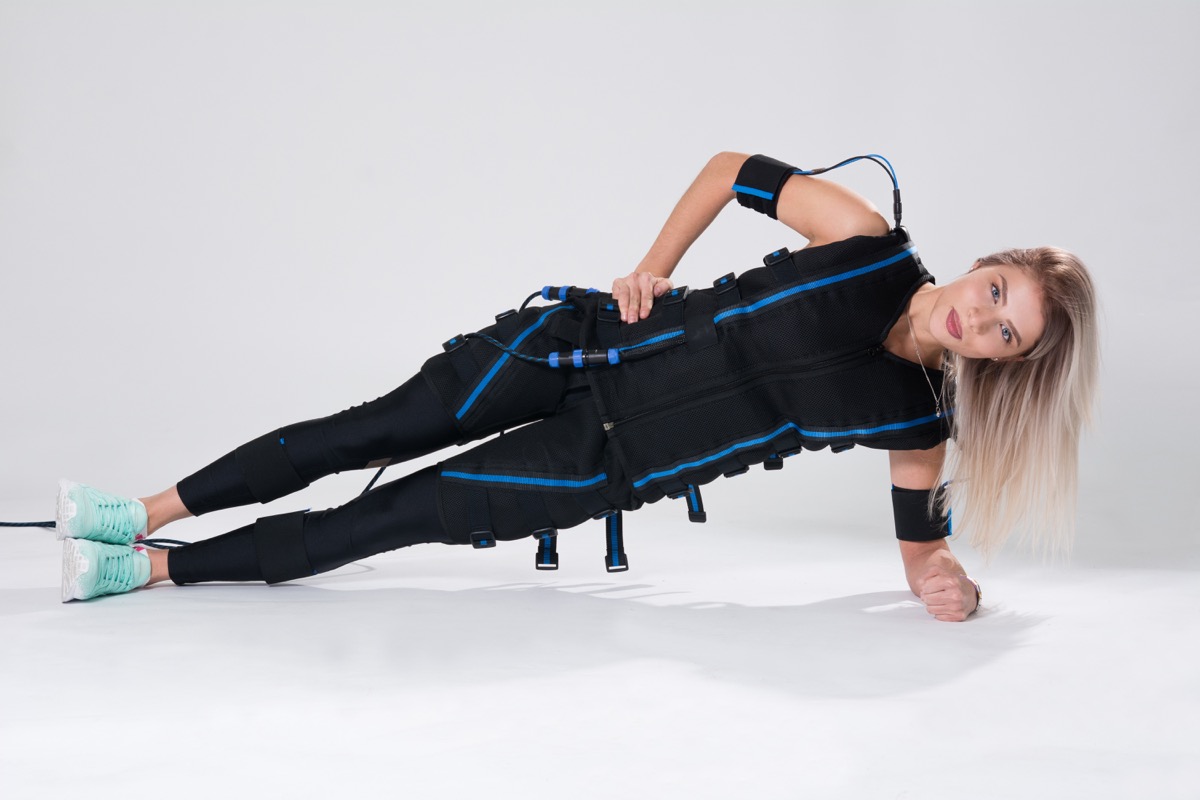 Woman doing an electrical stimulation workout