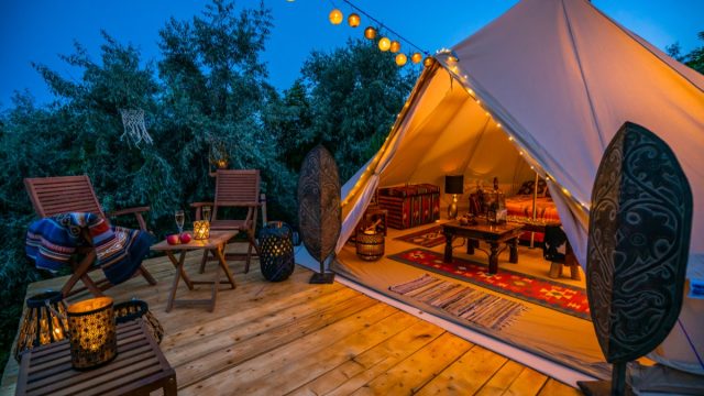 glamping tent outside at night