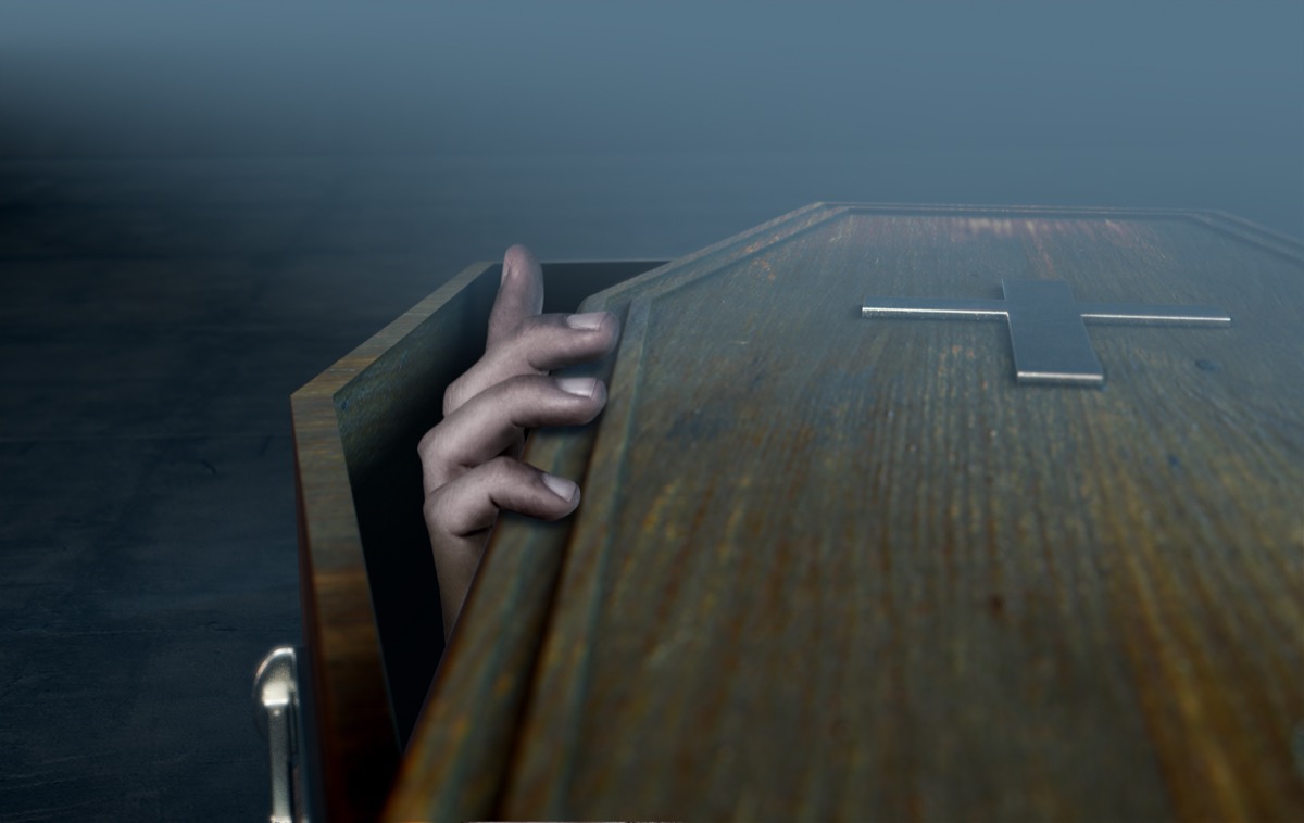 hand coming out of coffin