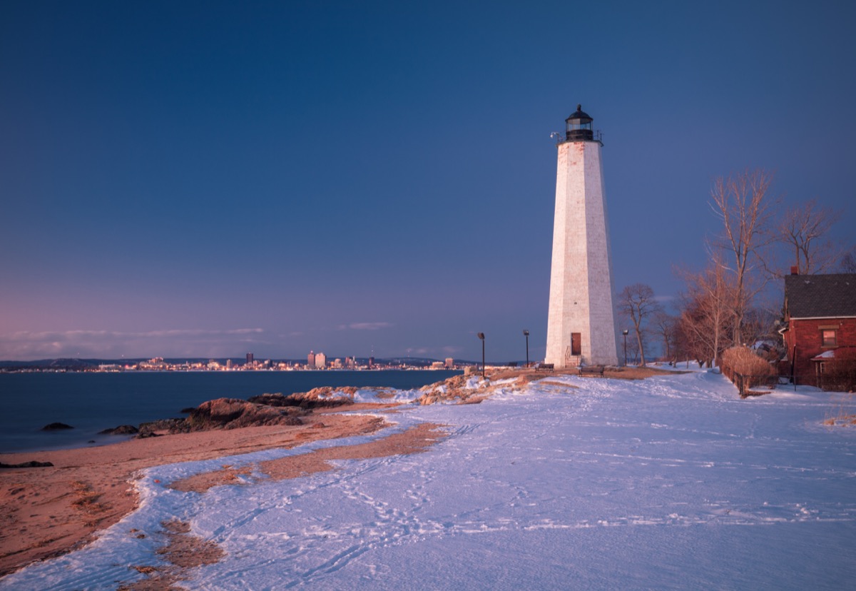 A lighthouse covered in snow in New Haven Connecticut