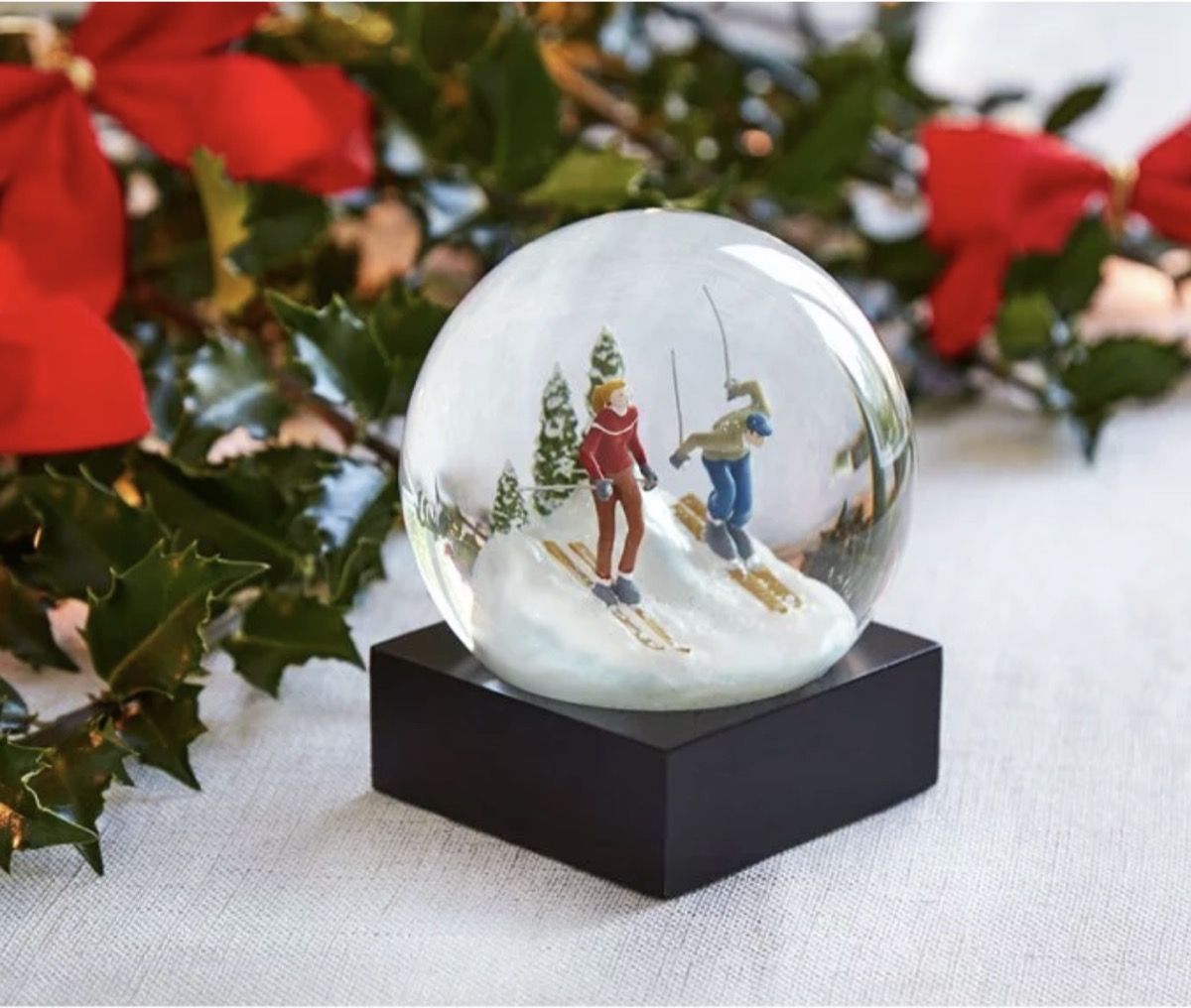 https://bestlifeonline.com/wp-content/uploads/sites/3/2019/11/modern-snow-globe.jpg?quality=82&strip=all