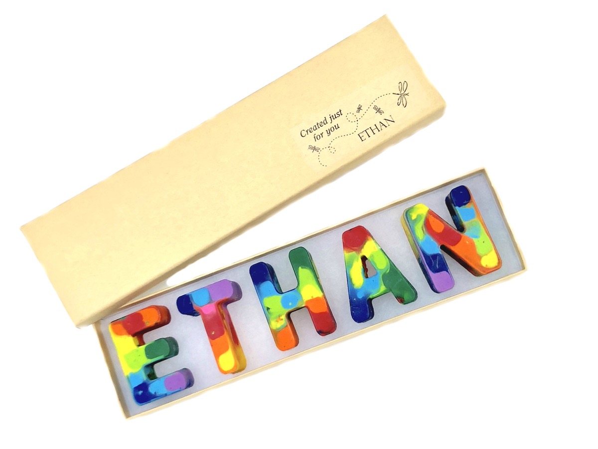 box of colorful name crayons with the name Ethan spelled out