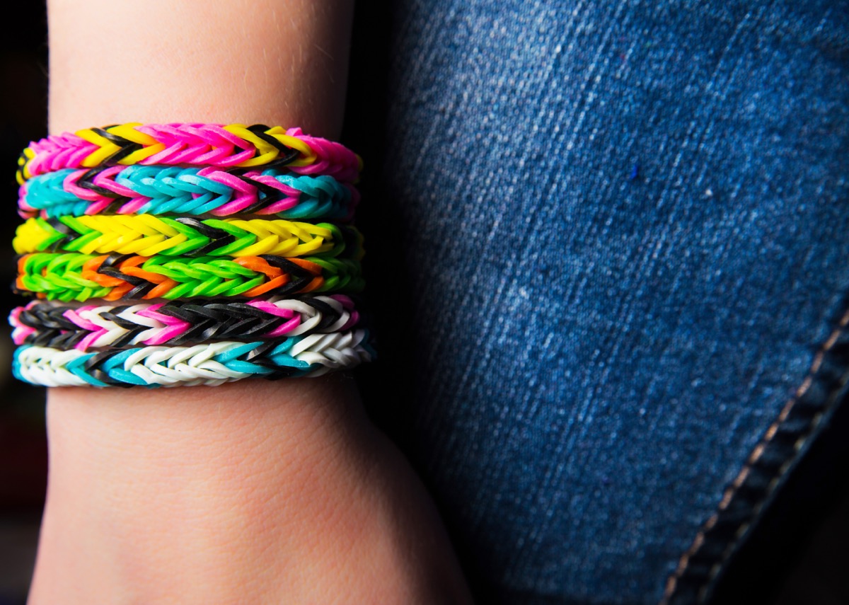 rainbow loom bracelets on young girl's arm