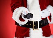 Santa giving kids lumps of coal for Christmas