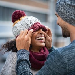 young couple laughing in the winter