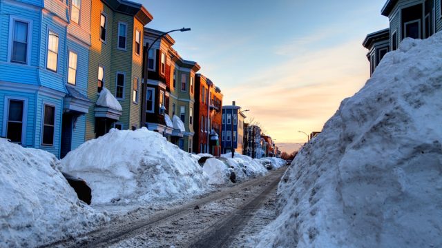 https://bestlifeonline.com/wp-content/uploads/sites/3/2019/11/snow-covere-street-boston.jpg?quality=82&strip=1&resize=640%2C360