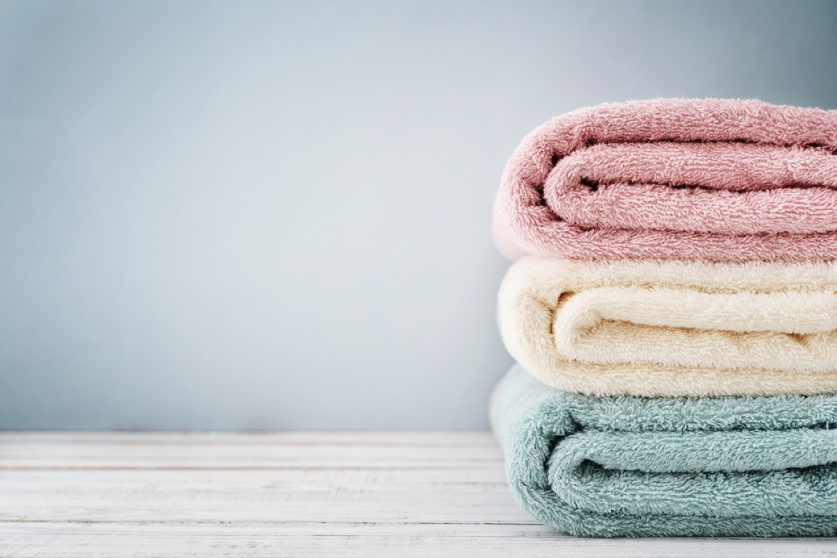 stack of green, white, and pink towels