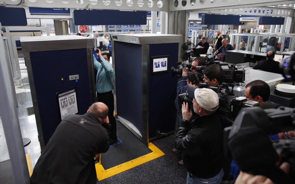 TSA personnel demonstrate the a new backscatter imaging device at O'Hare International Airport in Chicago on March 15, 2010. O'Hare is the second airport to receive one of the 150 backscatter units purchased in 2009 with funding from the American Recovery and Reinvestment Act.