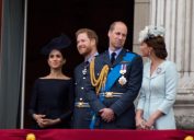Meghan, Harry, William, and Kate watch the RAF 100 celebrations from the balcony at Buckingham palace.
