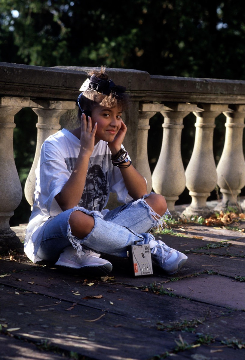 people, teenager, 1980s, exterior, girl with walkman, sitting on ground, circa 1989, Additional-Rights-Clearences-NA
