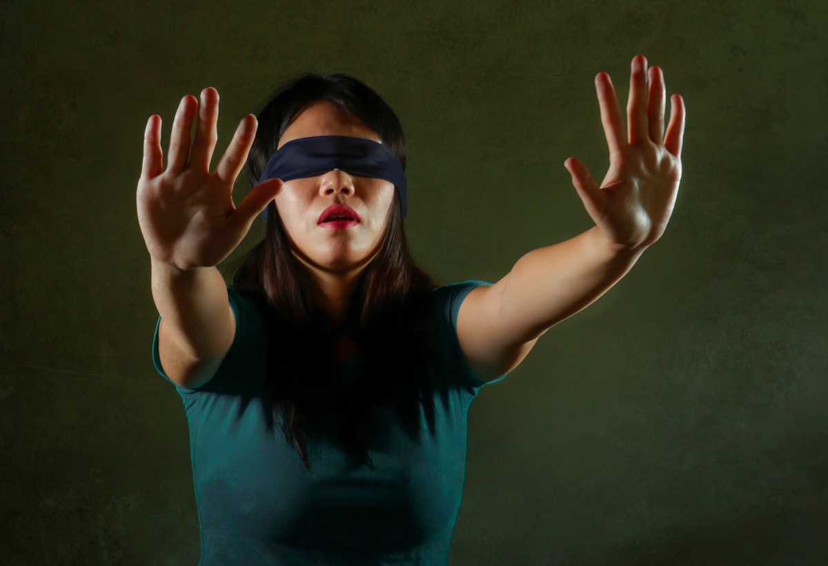 Woman wearing a blind fold