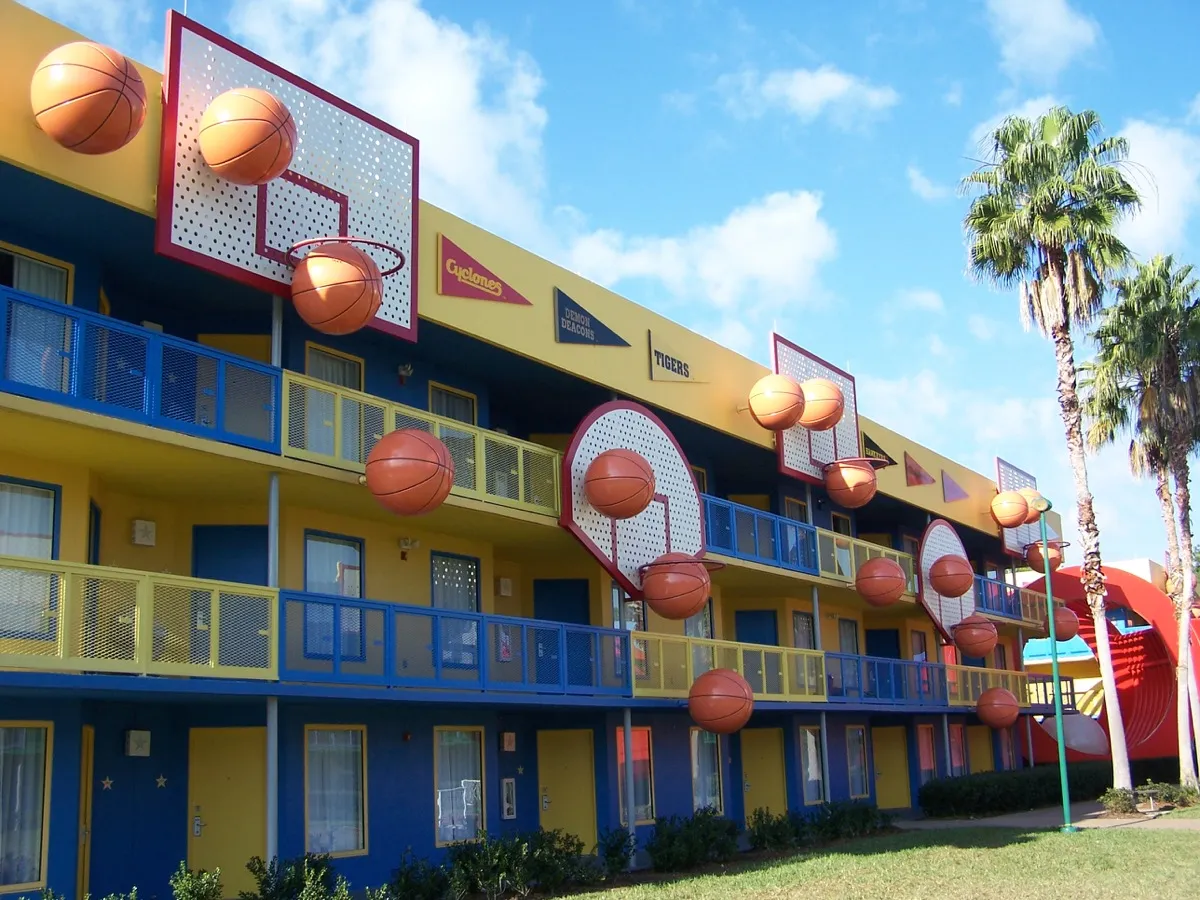 colorful disney hotel with basketballs on the railings