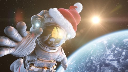 astronaut wearing santa hat