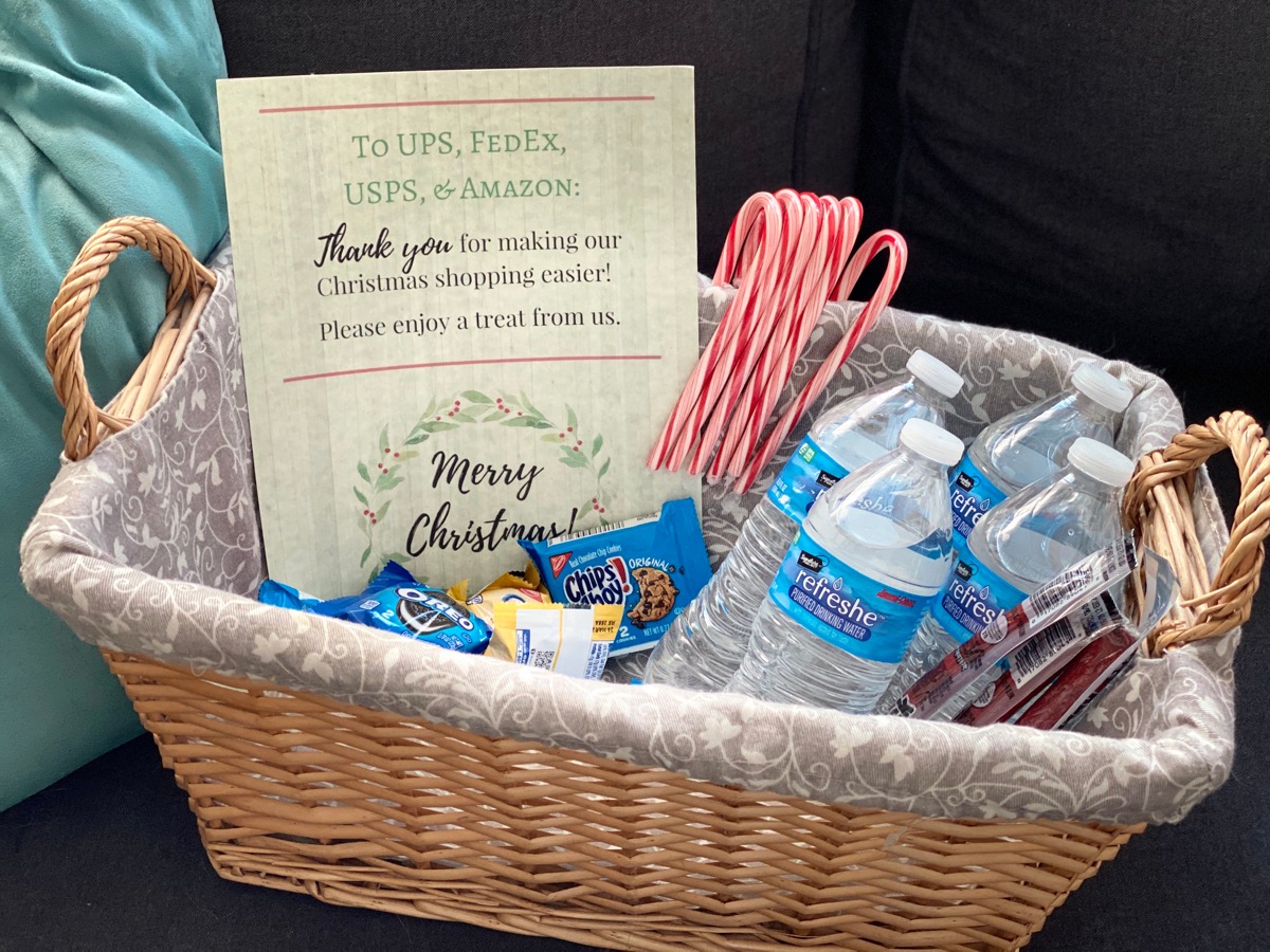Basket of snacks, water, candy canes left out for delivery man