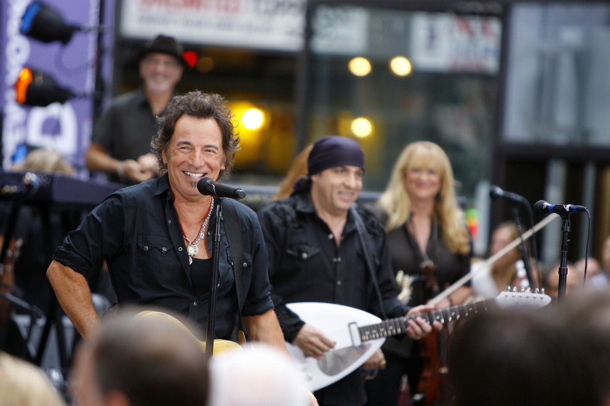Bruce Springsteen performing at a concert