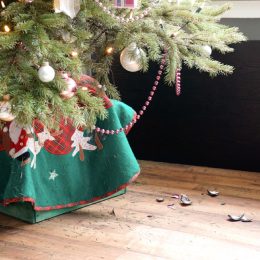 christmas tree needles on floor at end of christmas before disposal