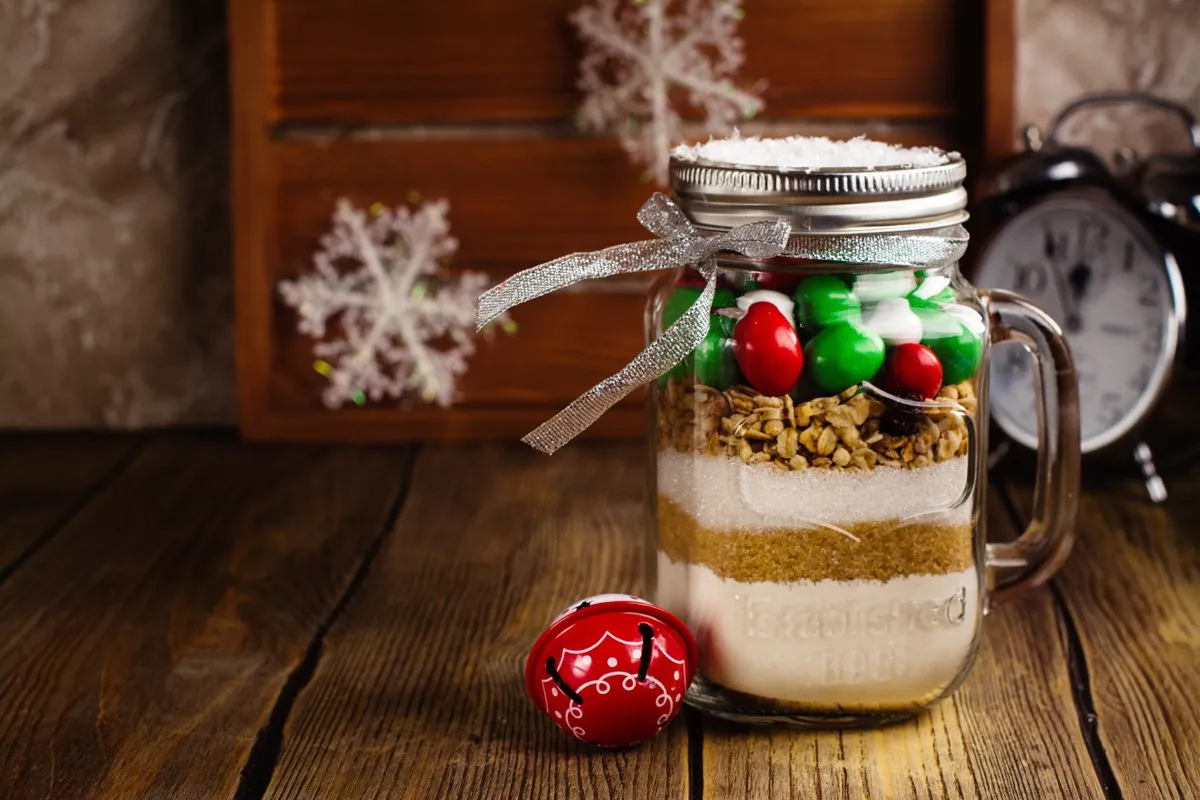 Holiday cookie ingredients in a mason jar