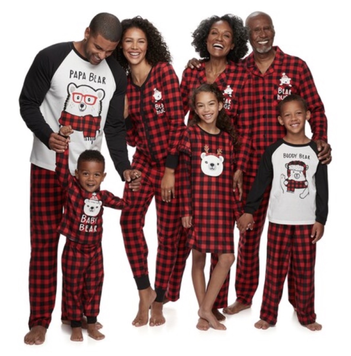 large black family in buffalo check red and black pajamas with "cool bear" on them