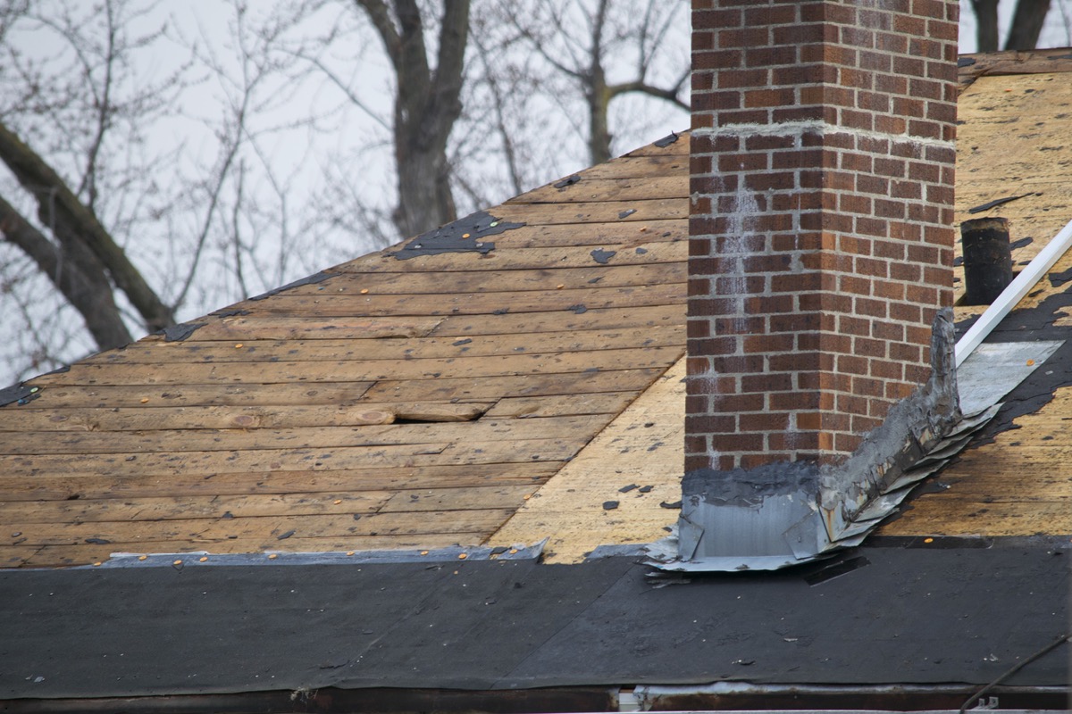 damaged chimney flashing on roof