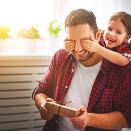 little girl surprising dad