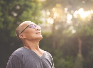 relaxed senior man outfoors