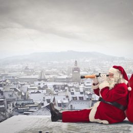 santa claus looking over the city