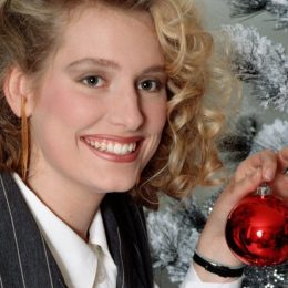 1980s Teenager decorating christmas tree